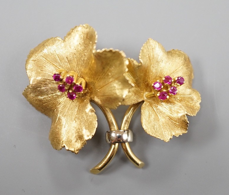 A gold and ruby cluster set double flower head brooch